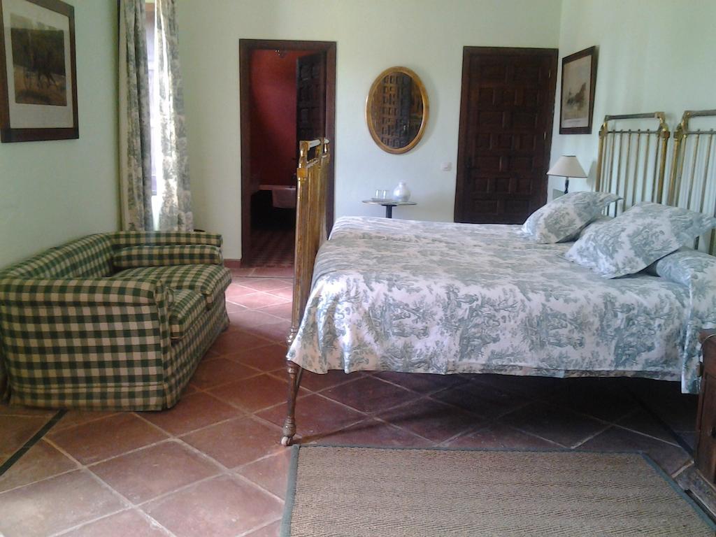 فندق Hacienda La Indiana لوس بالاسيوس ي فيلافرانكه الغرفة الصورة